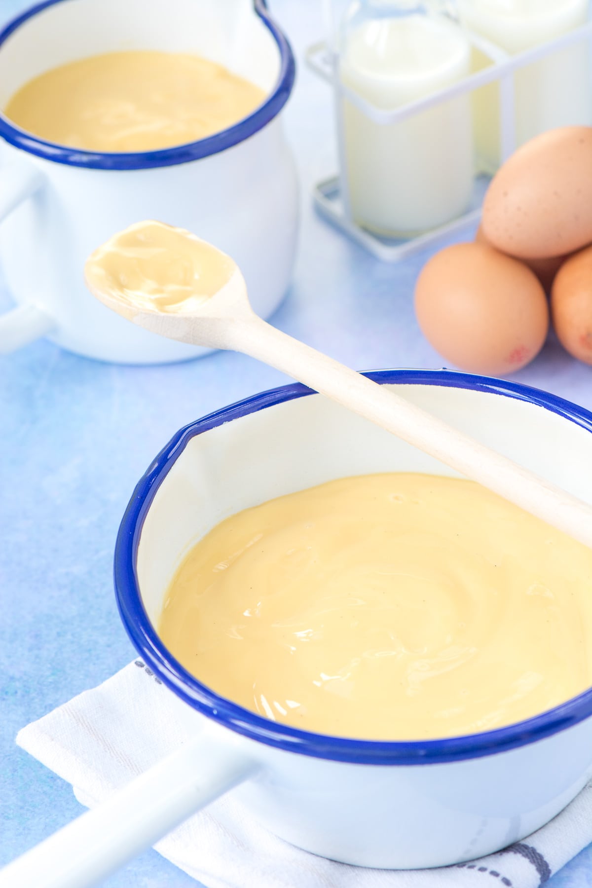 A pan of delicious homemade custard made with egg yolks, milk, sugar, a little flour and plenty of vanilla extract.
