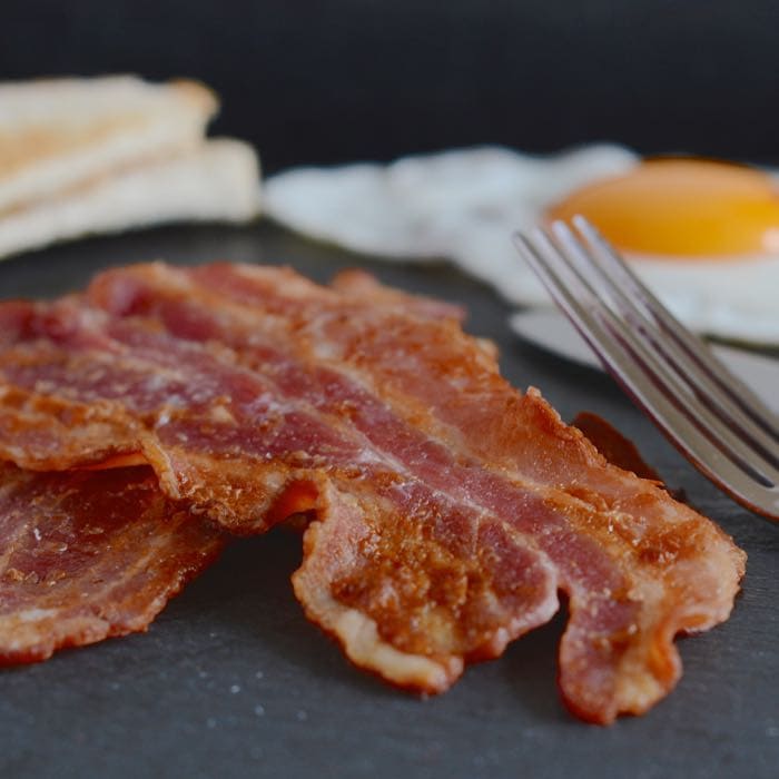 Making perfect crispy bacon at home is really simple. Follow these steps and you'll have perfect bacon every time (and even better it's really easy and takes almost no effort!).