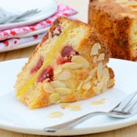 Marzipan and Cherry Cake Recipe - Delicious almond sponge with cherries and a layer of gooey marzipan in the centre.