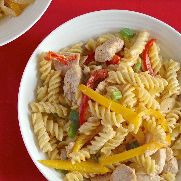 My delicious creamy cajun chicken pasta recipe. Perfect for dinner in a hurry and as pasta salad for lunch the next day too!