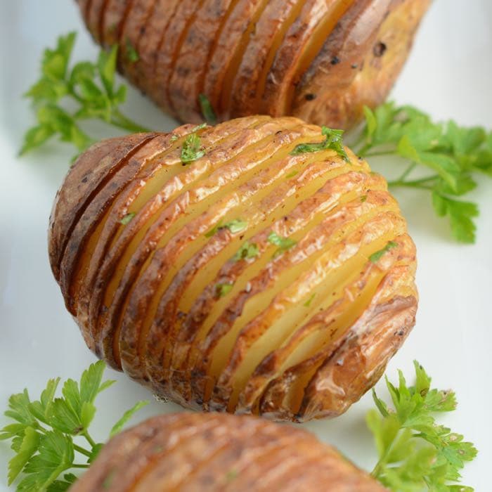 Looking down on a hasselback potato, showing the distinctive slits.