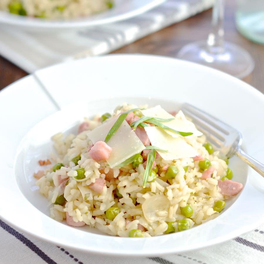 A delicious risotto with pancetta, peas, manchego cheese and tarragon. Perfect for a relaxed evening meal with a glass of white wine.