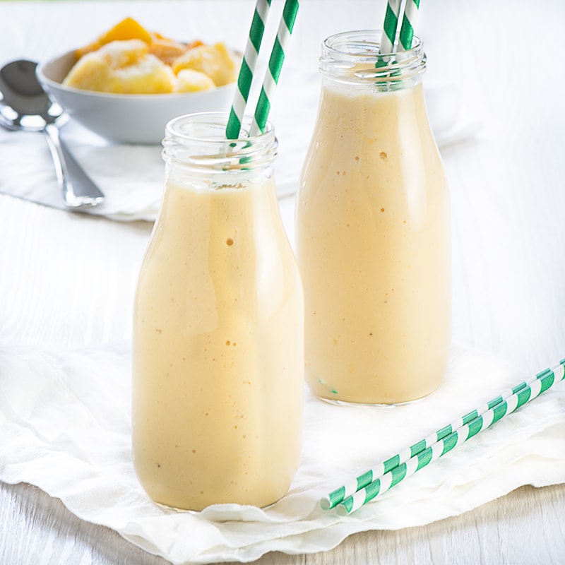 A delicious refreshing smoothie with coconut milk, banana, mango and pineapple.