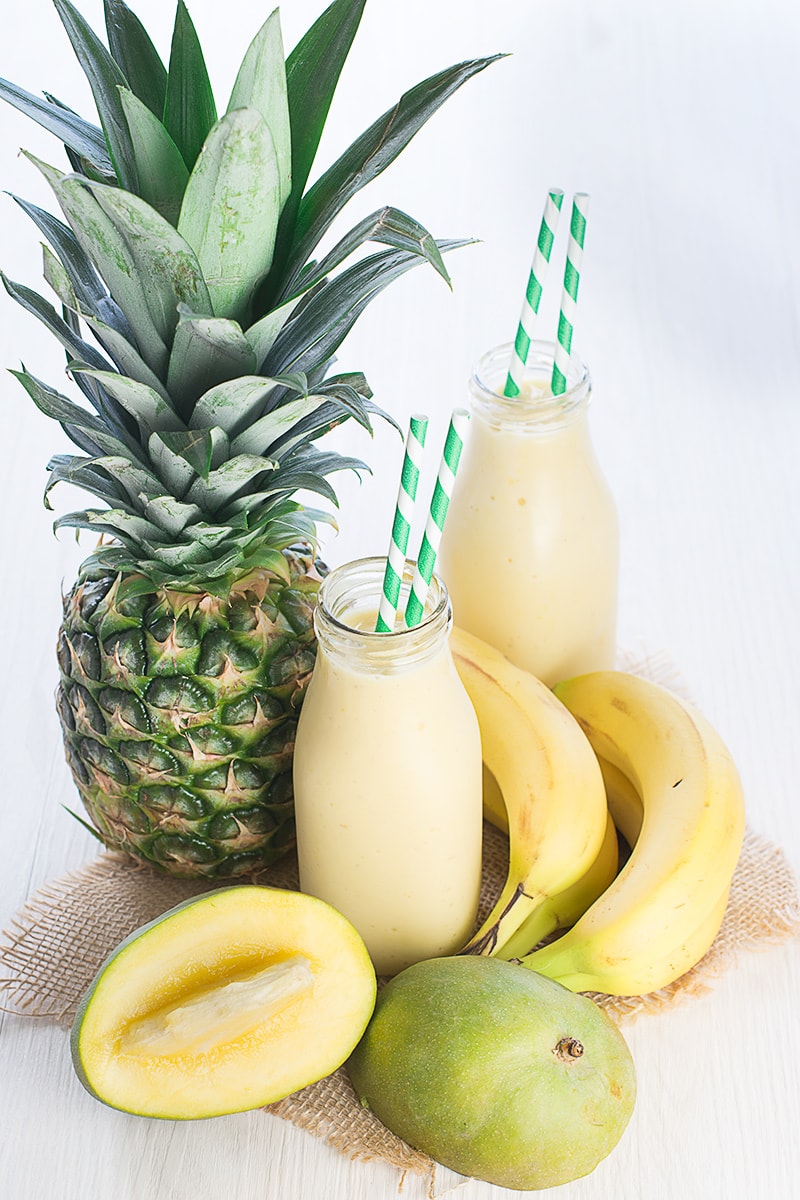 A delicious refreshing smoothie with coconut milk, banana, mango and pineapple.