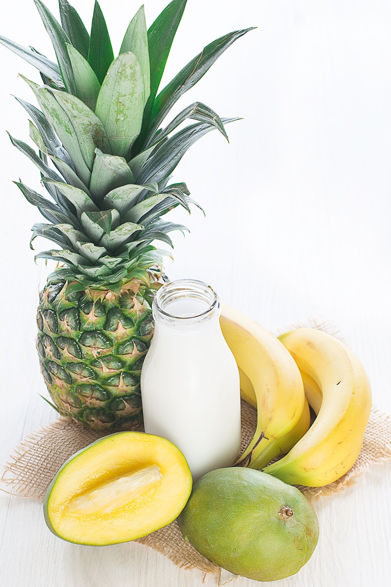 A delicious refreshing smoothie with coconut milk, banana, mango and pineapple.