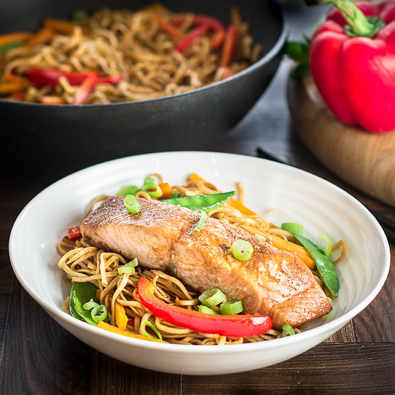 Soy and sesame marinated salmon served with a delicious vegetable chow mien. A quick and healthy midweek dinner.