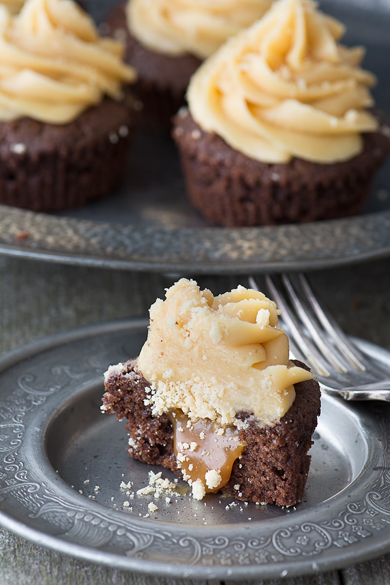 Millionaires' Cupcakes - Chocolate cupcakes topped with caramel buttercream with a hidden shortbread and caramel centre.