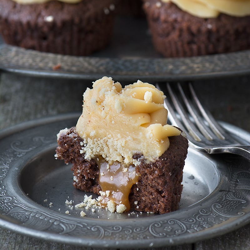 Millionaires' Cupcakes - Chocolate cupcakes topped with caramel buttercream with a hidden shortbread and caramel centre.