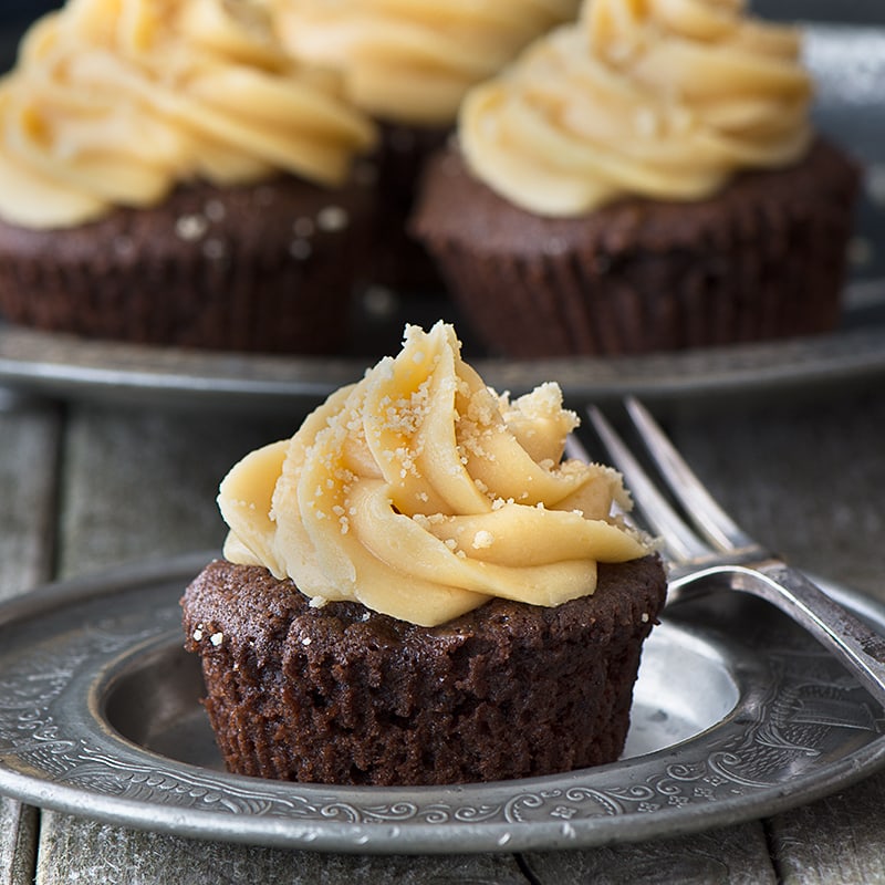Millionaires' Cupcakes - Chocolate cupcakes topped with caramel buttercream with a hidden shortbread and caramel centre.