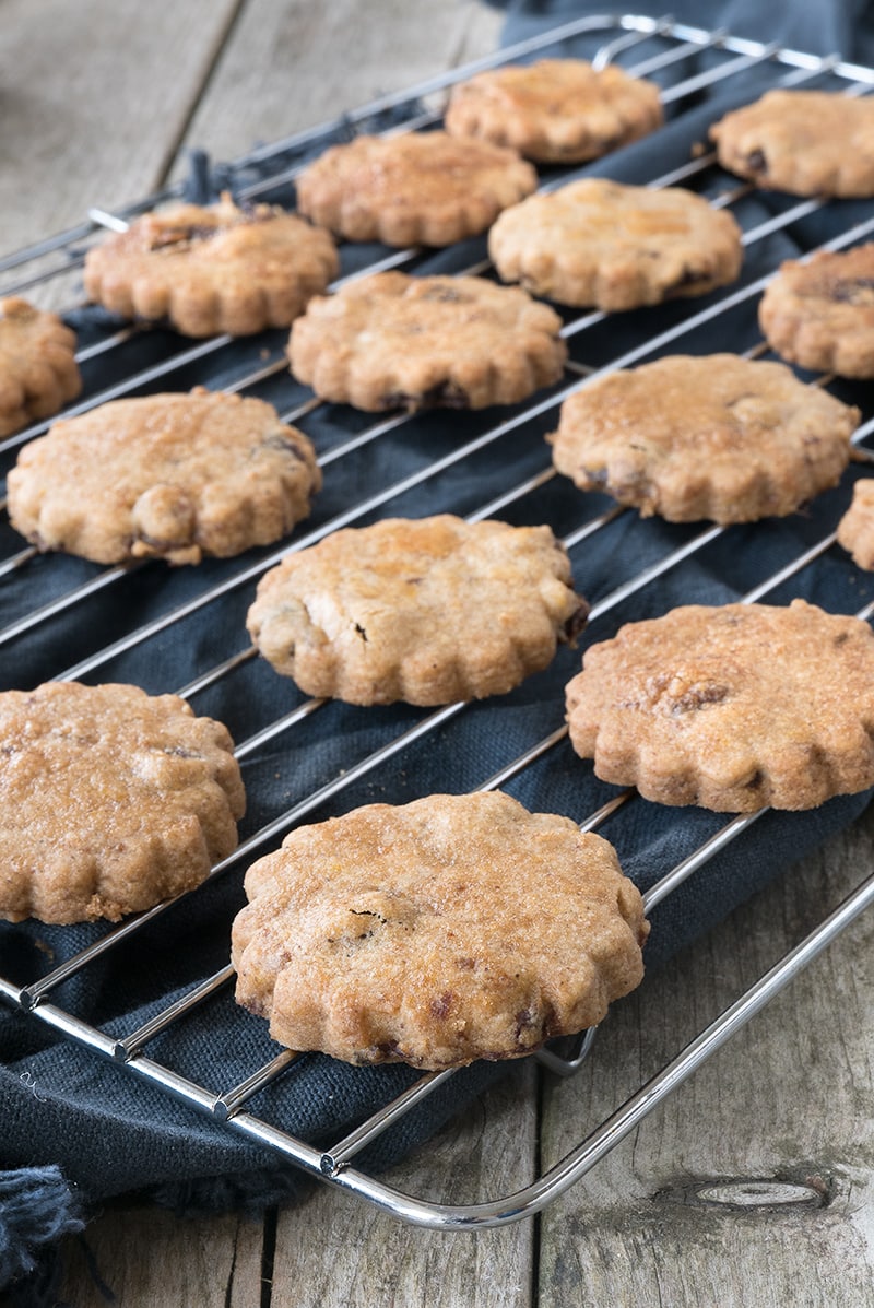 Bara Brith biscuits - A crunchy spiced shortbread biscuit with orange zest and tea-infused raisins.