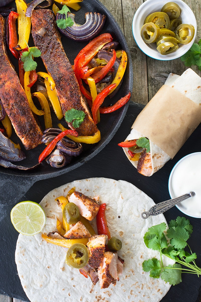 Salmon makes a great alternative to fish or beef in these Cajun salmon fajitas, for a delicious dinner with only a few minutes effort.