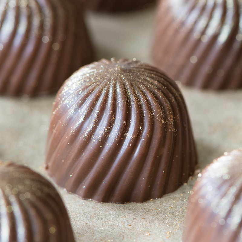 Delicious festive chocolates with a milk chocolate, mincemeat and brandy truffle filling.
