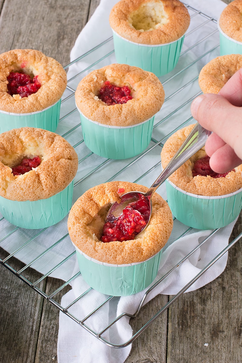 The classic dessert in cupcake form - Raspberry soaked sponge finger-style cupcakes filled with fresh raspberries and custard and topped with whipped vanilla cream.