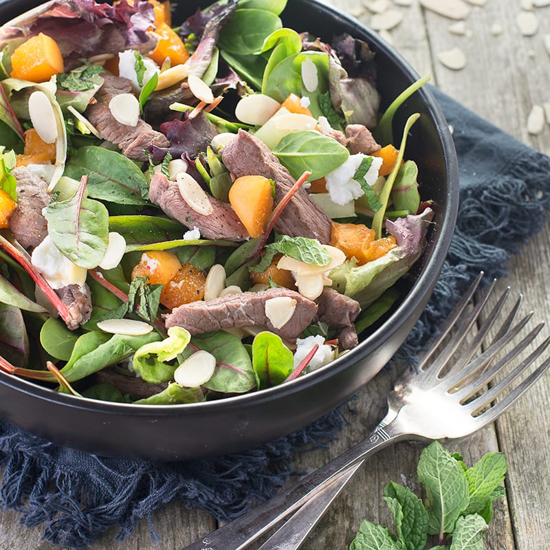 Liven up your lunch with this delicious lamb salad with flaked almonds, apricots and goats cheese. Perfect for a healthy lunch or summer barbecue.