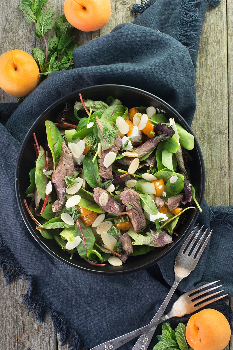 Liven up your lunch with this delicious lamb salad with flaked almonds, apricots and goats cheese. Perfect for a healthy lunch or summer barbecue.