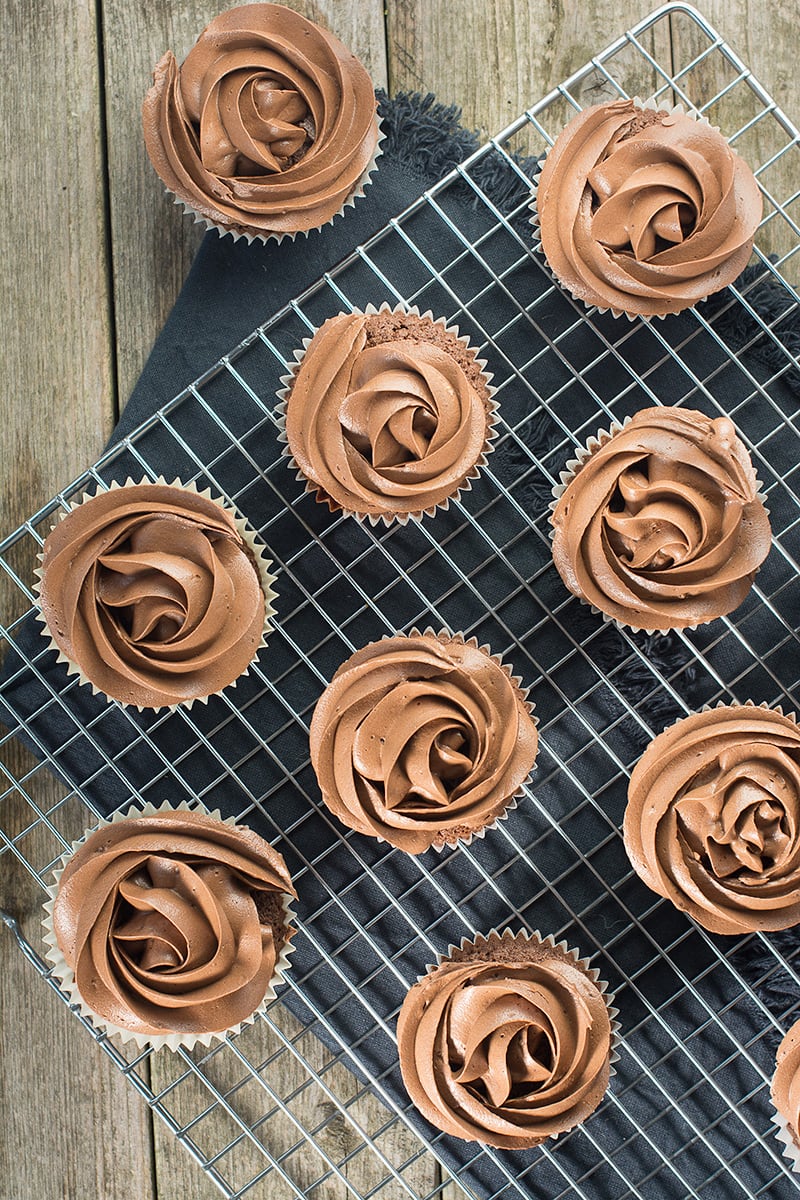 These chocolate cupcakes are easy to make and taste delicious. They get their extra chocolate-y flavour from both cocoa powder and grated milk chocolate. Perfect topped with smooth chocolate buttercream.