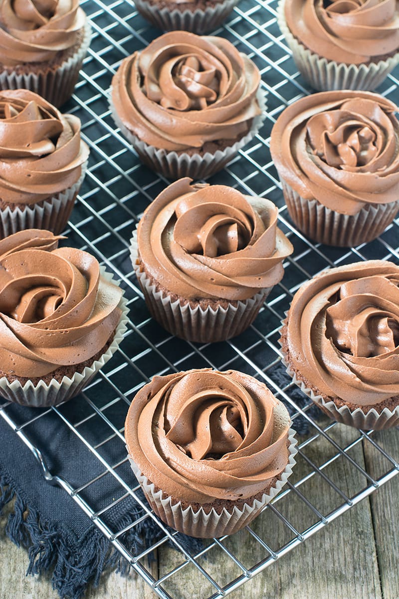 These chocolate cupcakes are easy to make and taste delicious. They get their extra chocolate-y flavour from both cocoa powder and grated milk chocolate. Perfect topped with smooth chocolate buttercream.