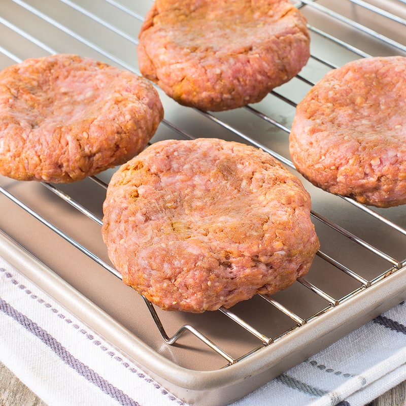 Spiced lamb burgers are so simple to make and packed full of flavour. Perfect for a quick and easy meal or BBQ served with cooling cucumber and mint raita.