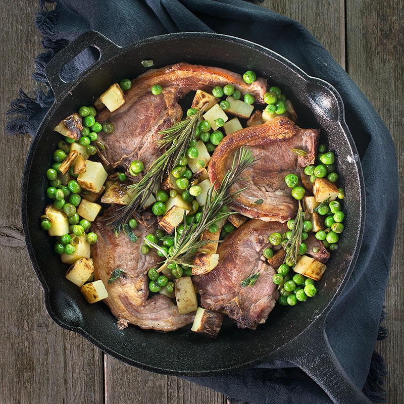 Lamb chops with crispy potatoes and minty peas is perfect for a quick dinner for two. Ready in half an hour and made in only one pan, so there's hardly any washing up! It's also free from many common allergens such as gluten, dairy and eggs, so perfect if you're cooking for someone that needs to avoid these things.