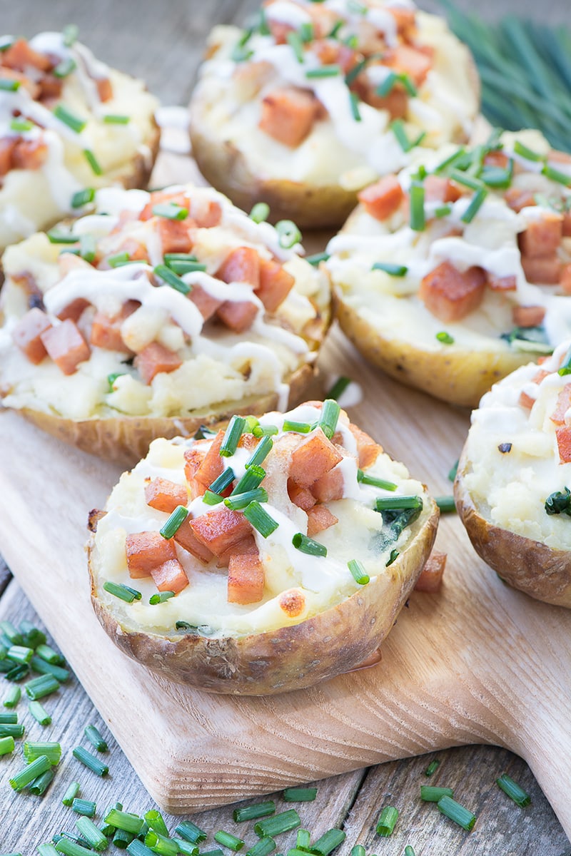Delicious potato skins filled with creamy mashed potato and topped with crispy SPAM® pieces and melted mozzarella cheese.