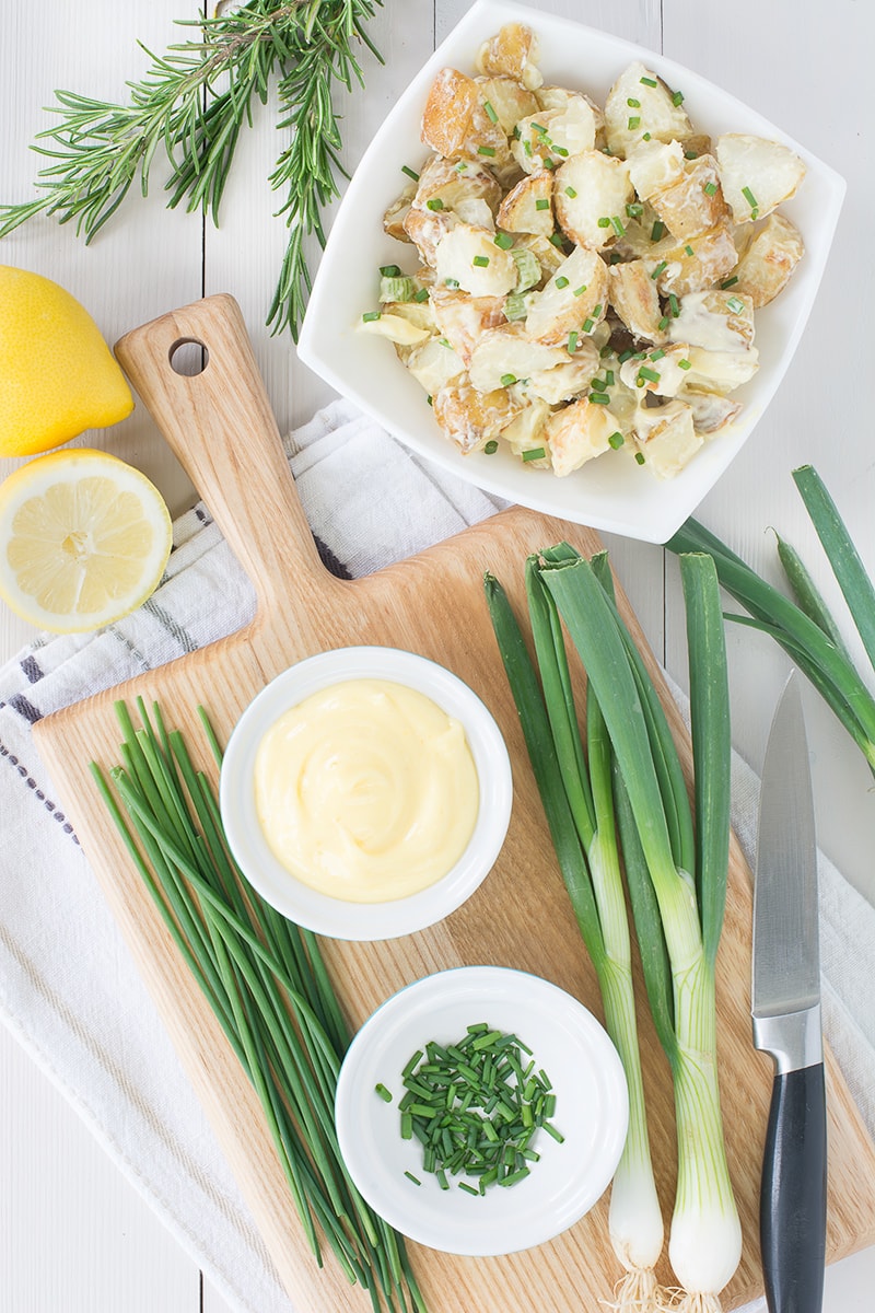 Roasting the potatoes for this potato salad with garlic and herbs means it's full of flavour, especially when you add homemade mayonnaise too. It's perfect for a summer barbecue or picnic.