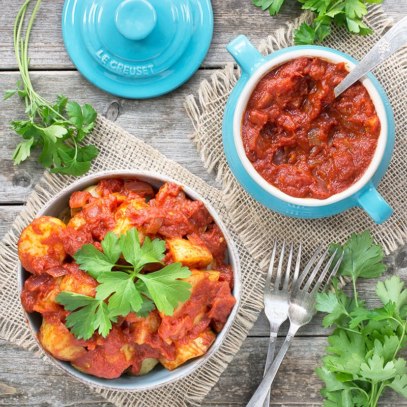 Delicious garlic roasted potatoes in a rich tomato sauce flavoured with smoked paprika.