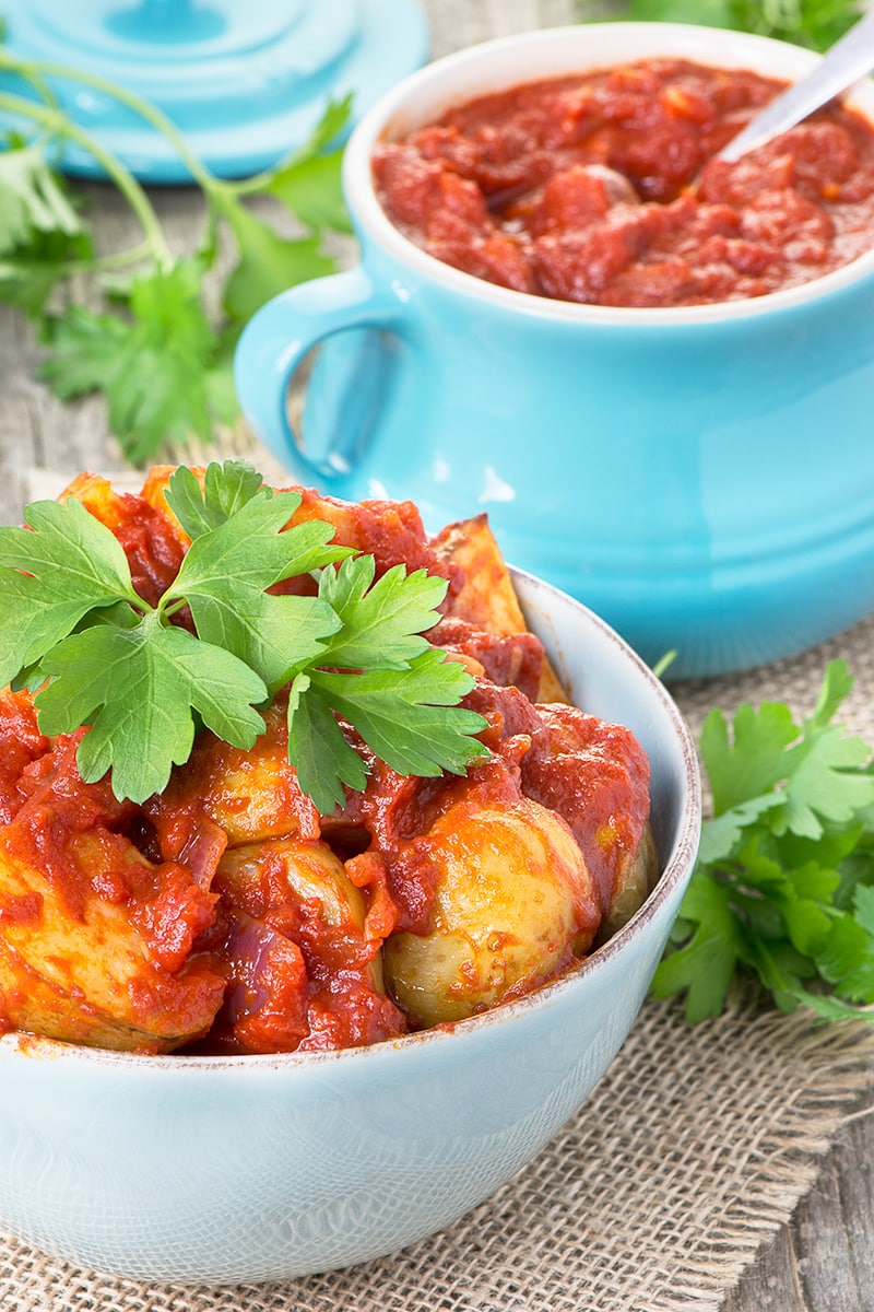Delicious garlic roasted potatoes in a rich tomato sauce flavoured with smoked paprika.