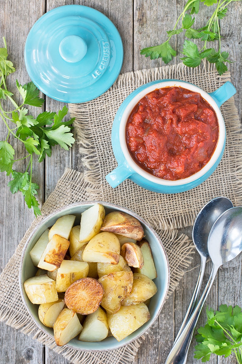 Delicious garlic roasted potatoes in a rich tomato sauce flavoured with smoked paprika.