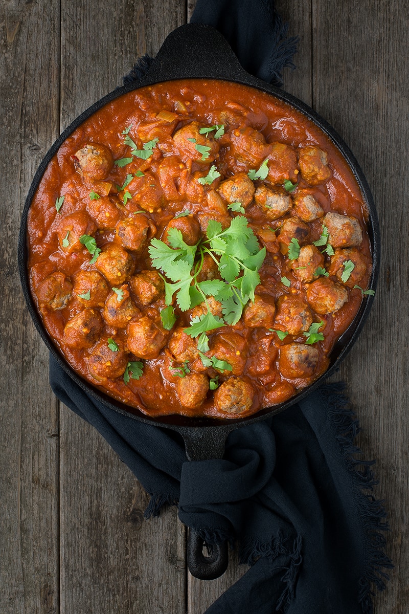 Delicious lamb meatballs in a spiced tomato sauce - perfect for a family meal or a curry tapas party.