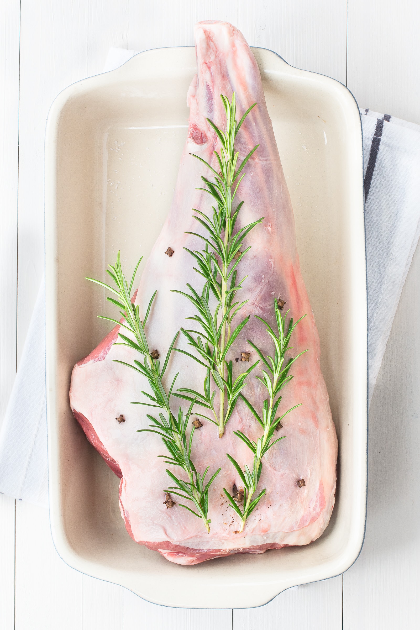 My festive roast leg of lamb flavoured with rosemary, cloves, orange and cranberries makes a fantastic alternative to turkey on Christmas day or to feed your family and friends over the festive period.