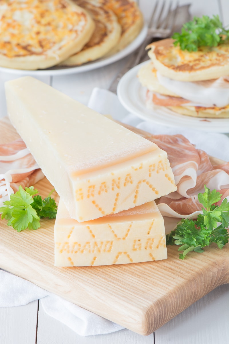 The distinctive markings on the side of Grana Padano cheese. 
