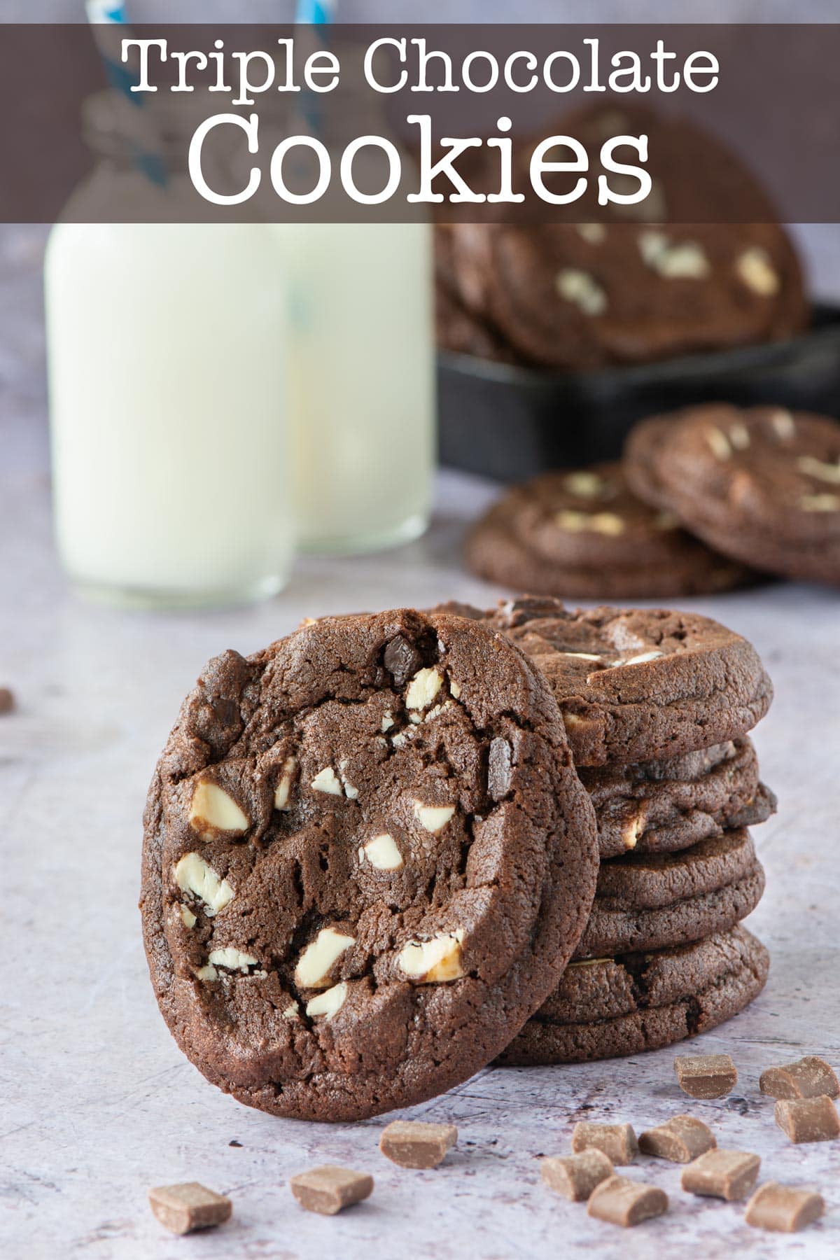 Triple Chocolate Cookies - The ultimate chocolate fix in biscuit form. Milk chocolate cookies with plenty of milk and dark chocolate chunks - Delicious!