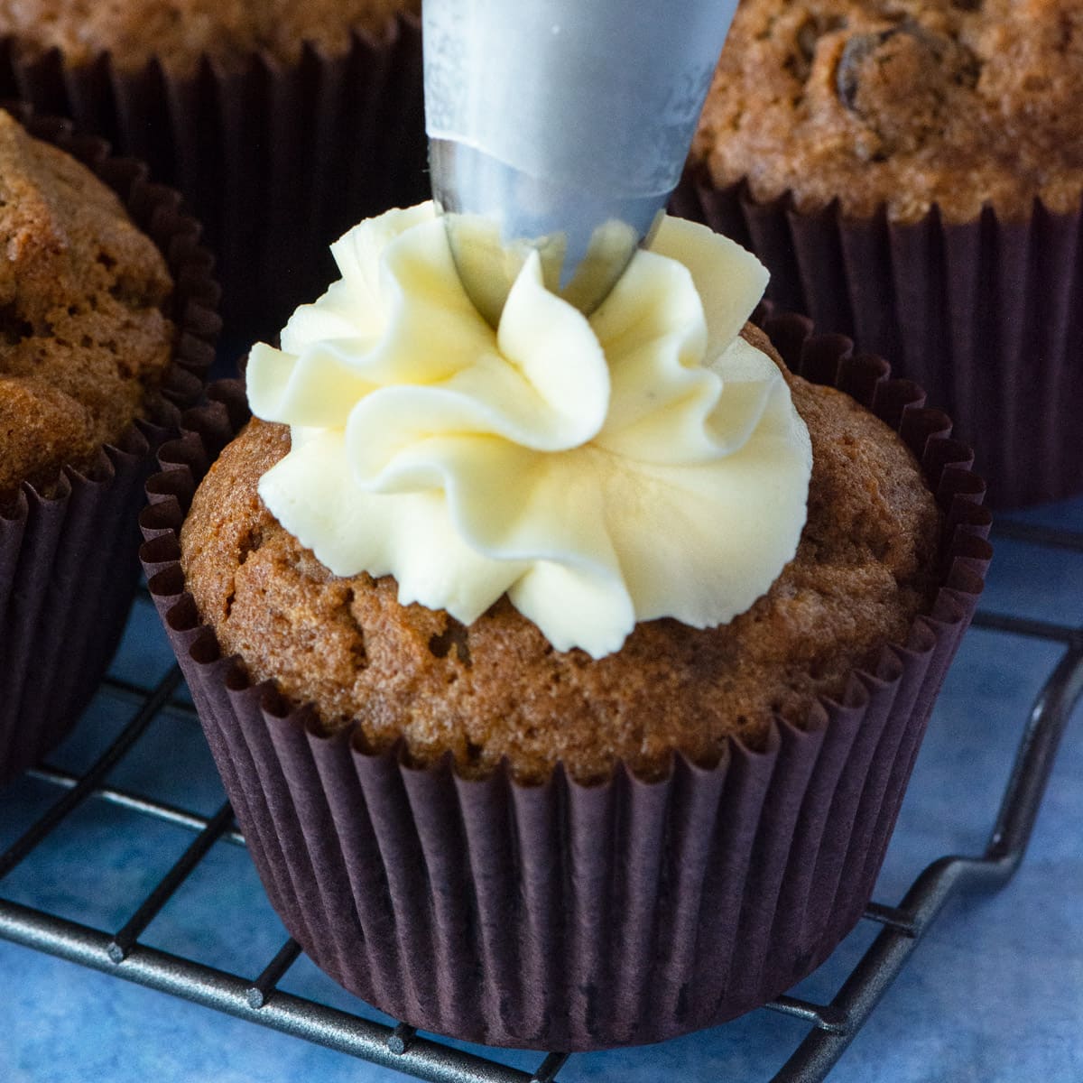 How to make delicious cream cheese buttercream perfect for decorating carrot cakes and red velvet cakes.