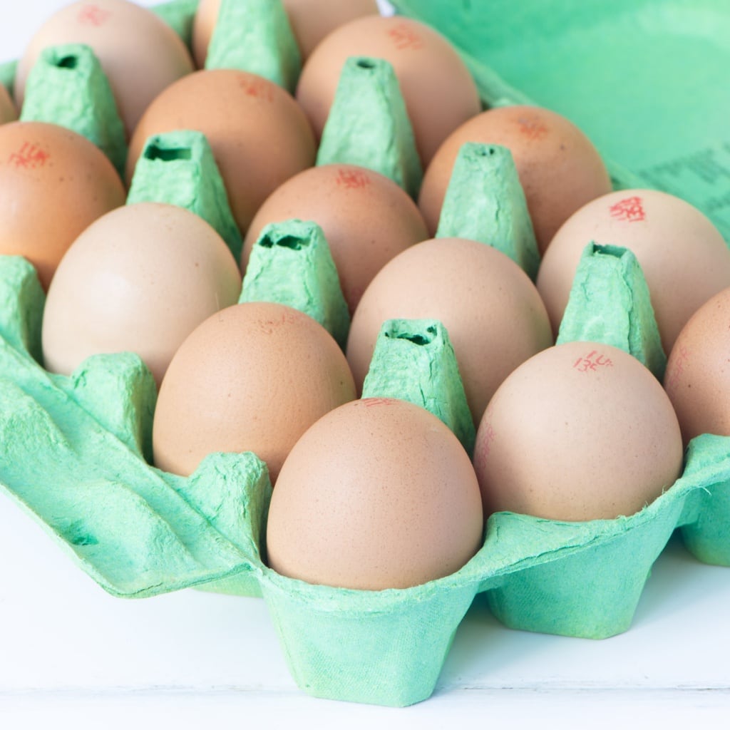 A dozen eggs in an egg box