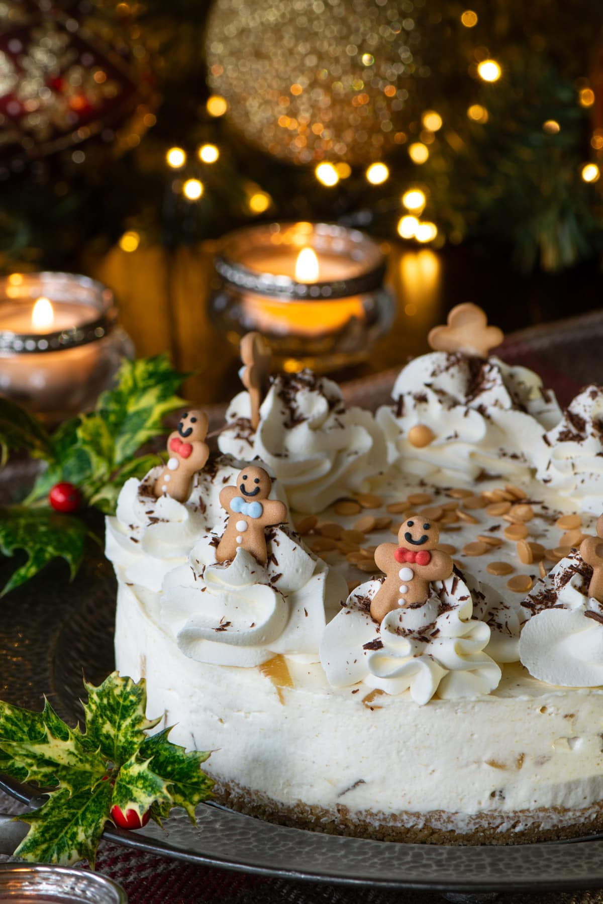 No-Bake Ginger Cheesecake - A crunchy biscuit base with a smooth ginger cheesecake filling and plenty of chopped stem ginger running through it, topped with swirls of whipped cream and grated dark chocolate.