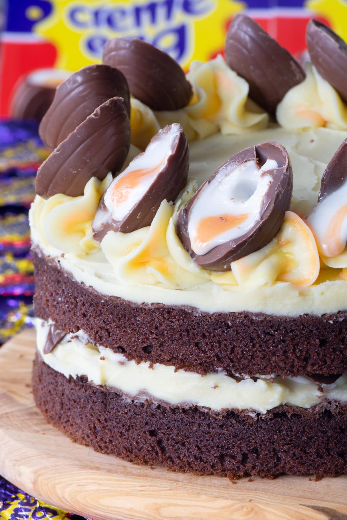 Creme Egg Cake. A chocolate sponge cake with white chocolate buttercream, topped with Creme Eggs.