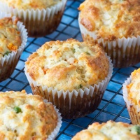 Savoury muffins on a cooling rack.