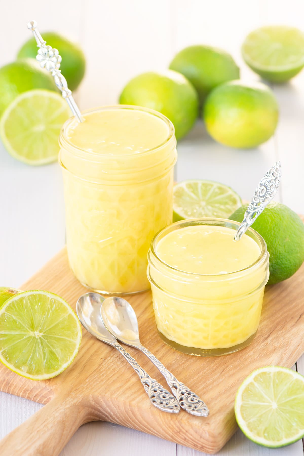 Two jars of homemade lime curd. 