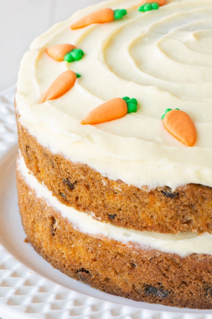 A close of of a carrot cake layer cake.