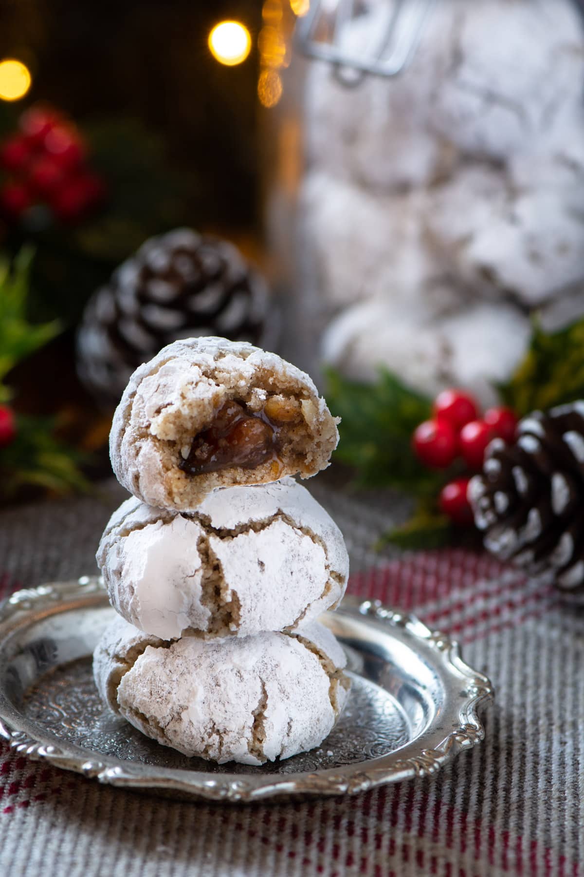 A close up of the Christmas amaretti biscuits showing the hidden mincemeat centre.