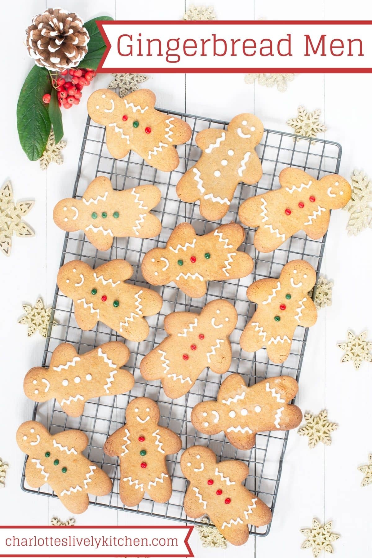 Gingerbread men decorated with royal icing on a wire rack.