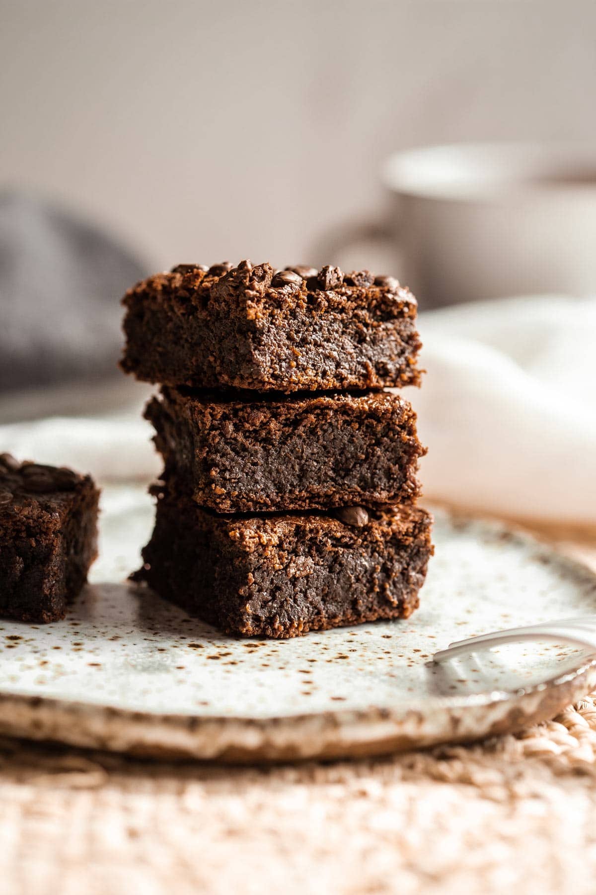 A pile of three vegan brownies.