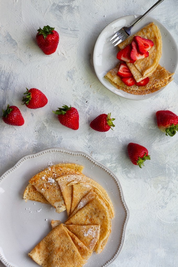 Vegan crepes served with strawberries.