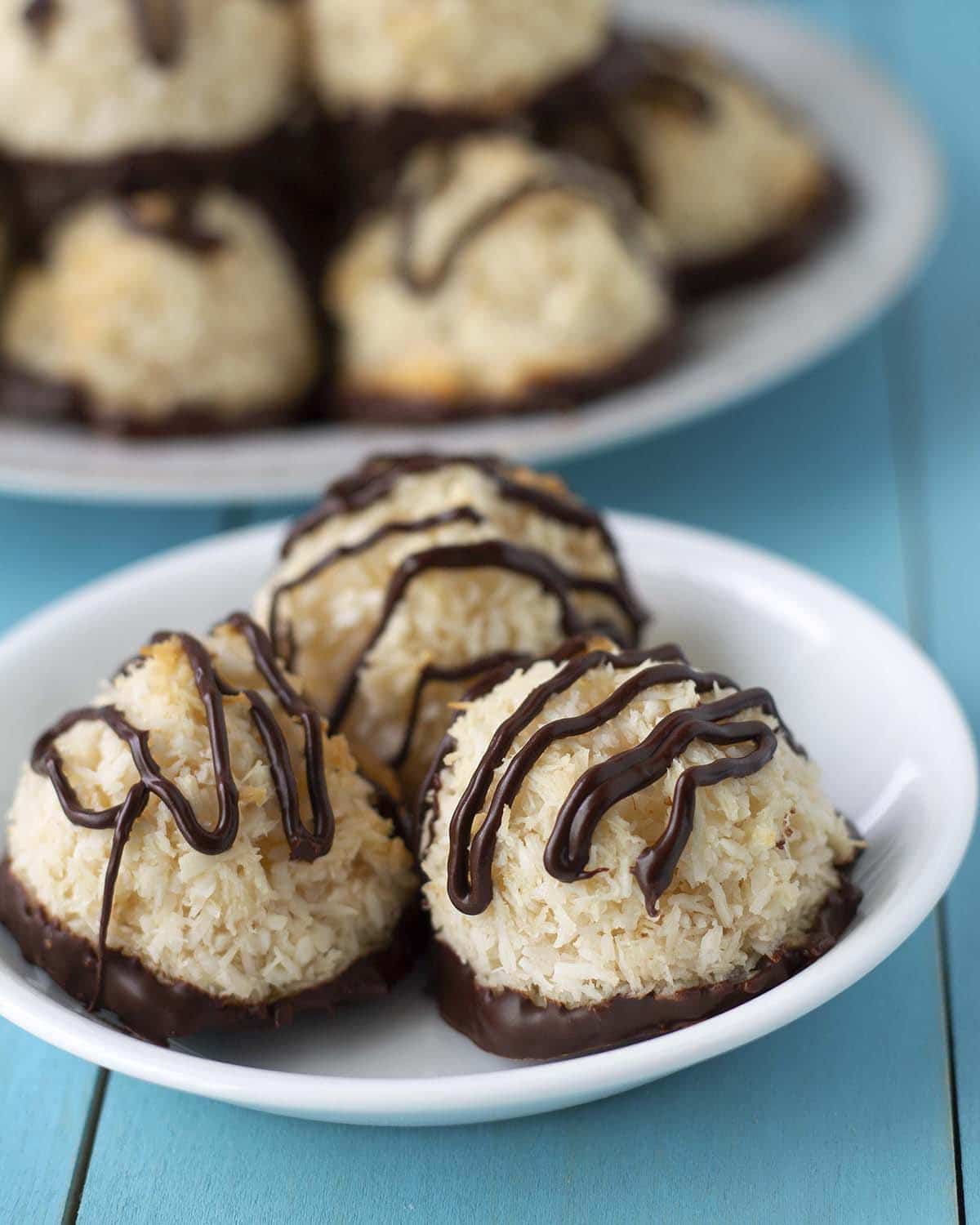 Vegan coconut macaroons topped with chocolate.