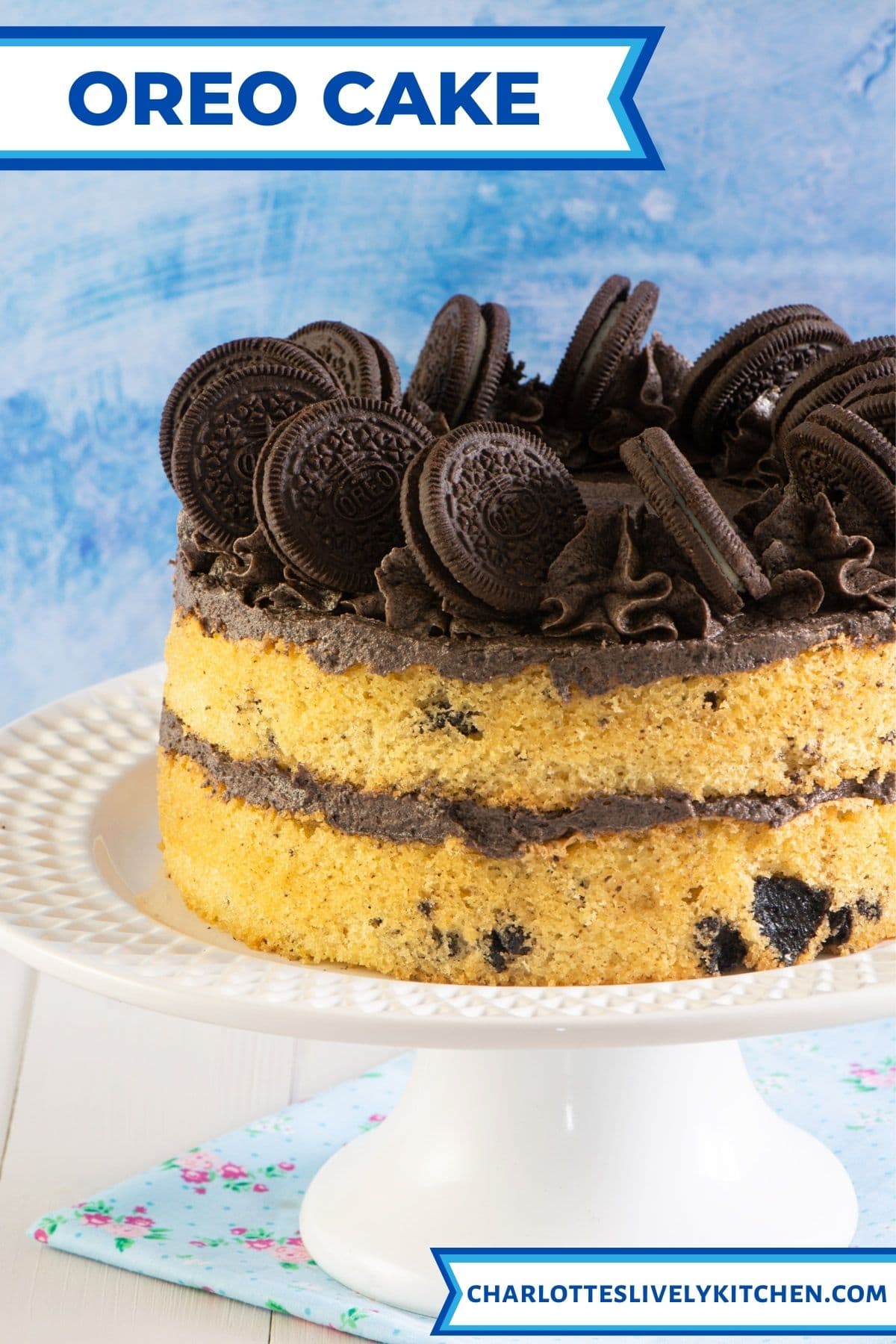 Oreo cake on a cake stand.