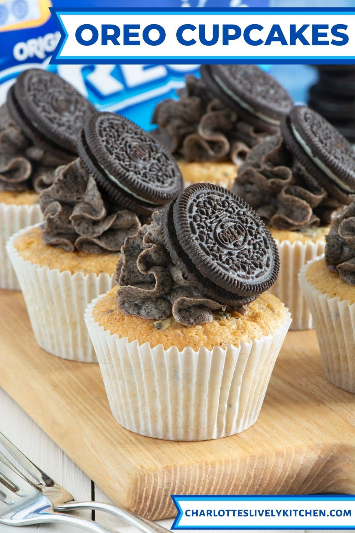 Close up of decorated oreo cupcakes on a wooden board.