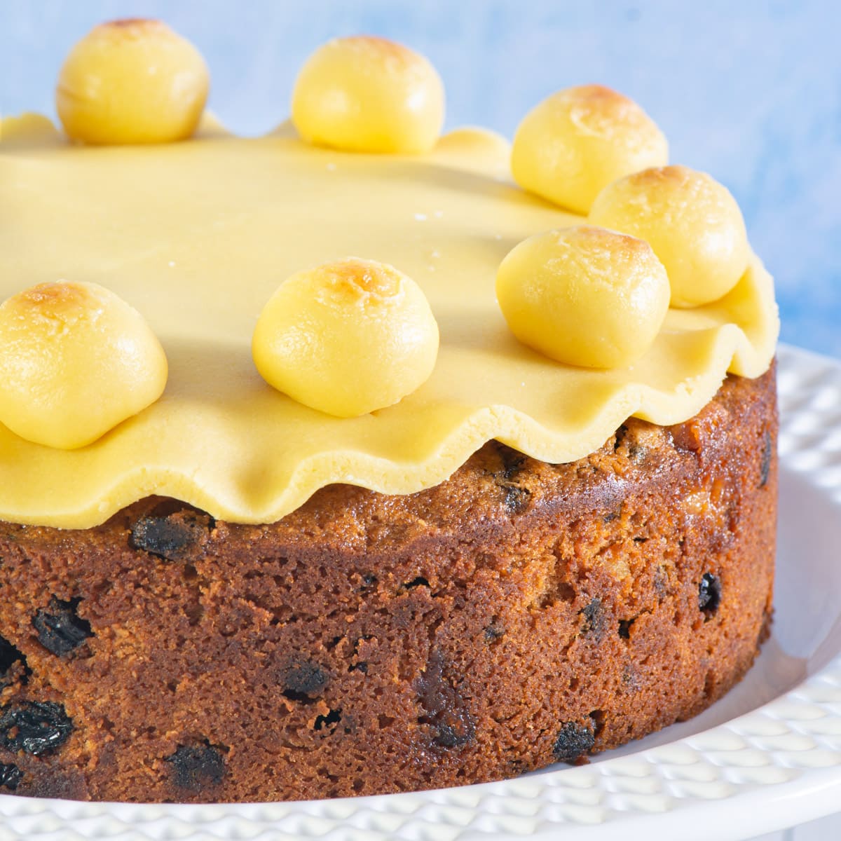 Close up of simnel cake with grilled marzipan all decoration. 