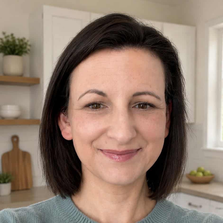 Charlotte with her kitchen in the background