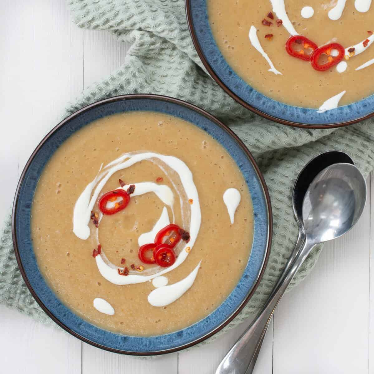 Two bowls of spiced parsnip soup from above