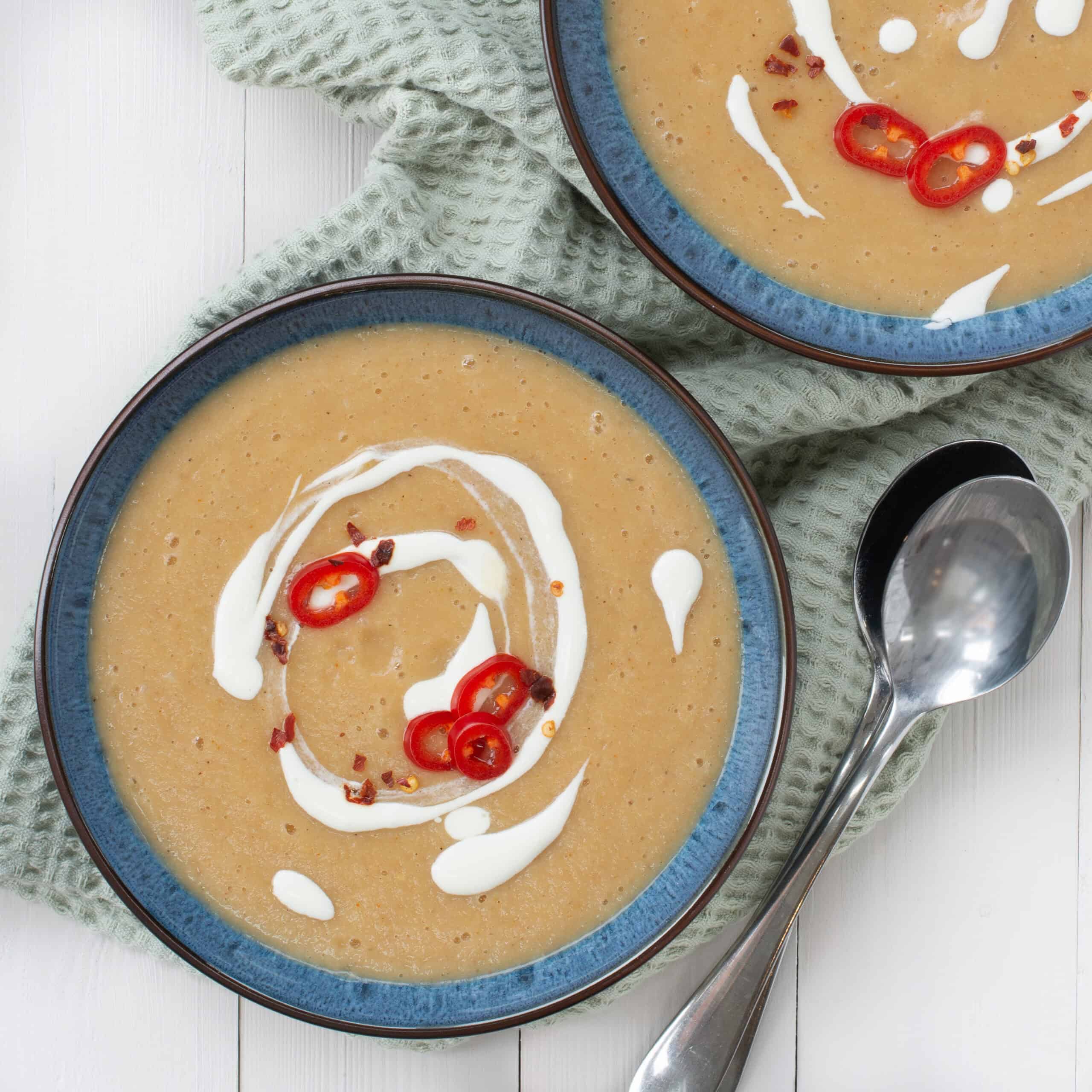 Two bowls of spiced parsnip soup from above